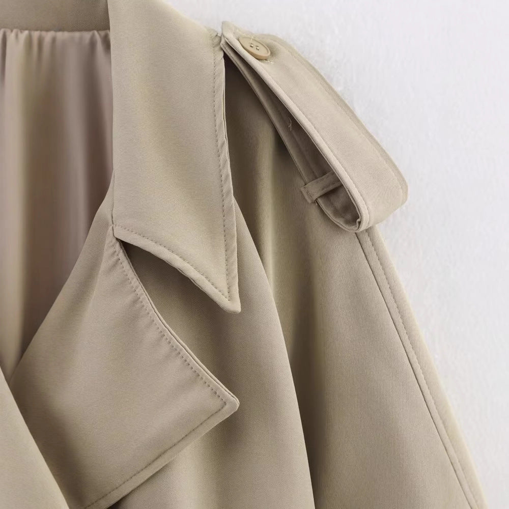 Long sleeved single breasted solid color trench coat for women
