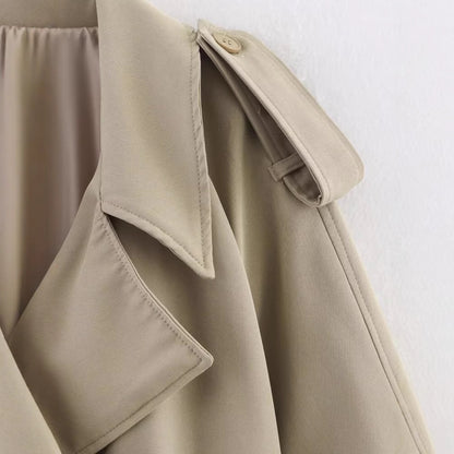 Long sleeved single breasted solid color trench coat for women