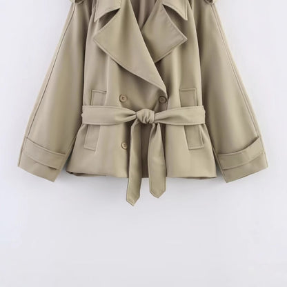 Long sleeved single breasted solid color trench coat for women