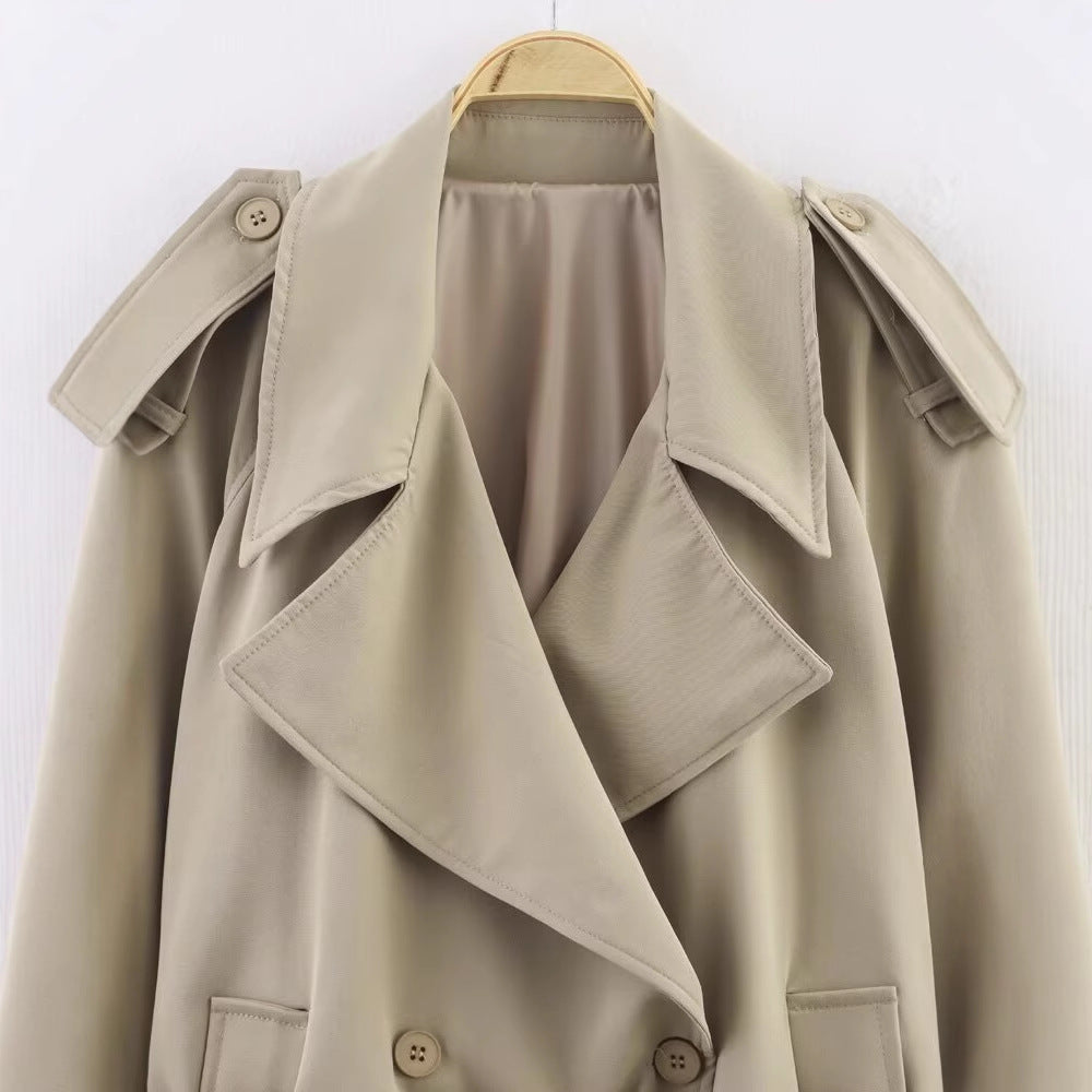 Long sleeved single breasted solid color trench coat for women
